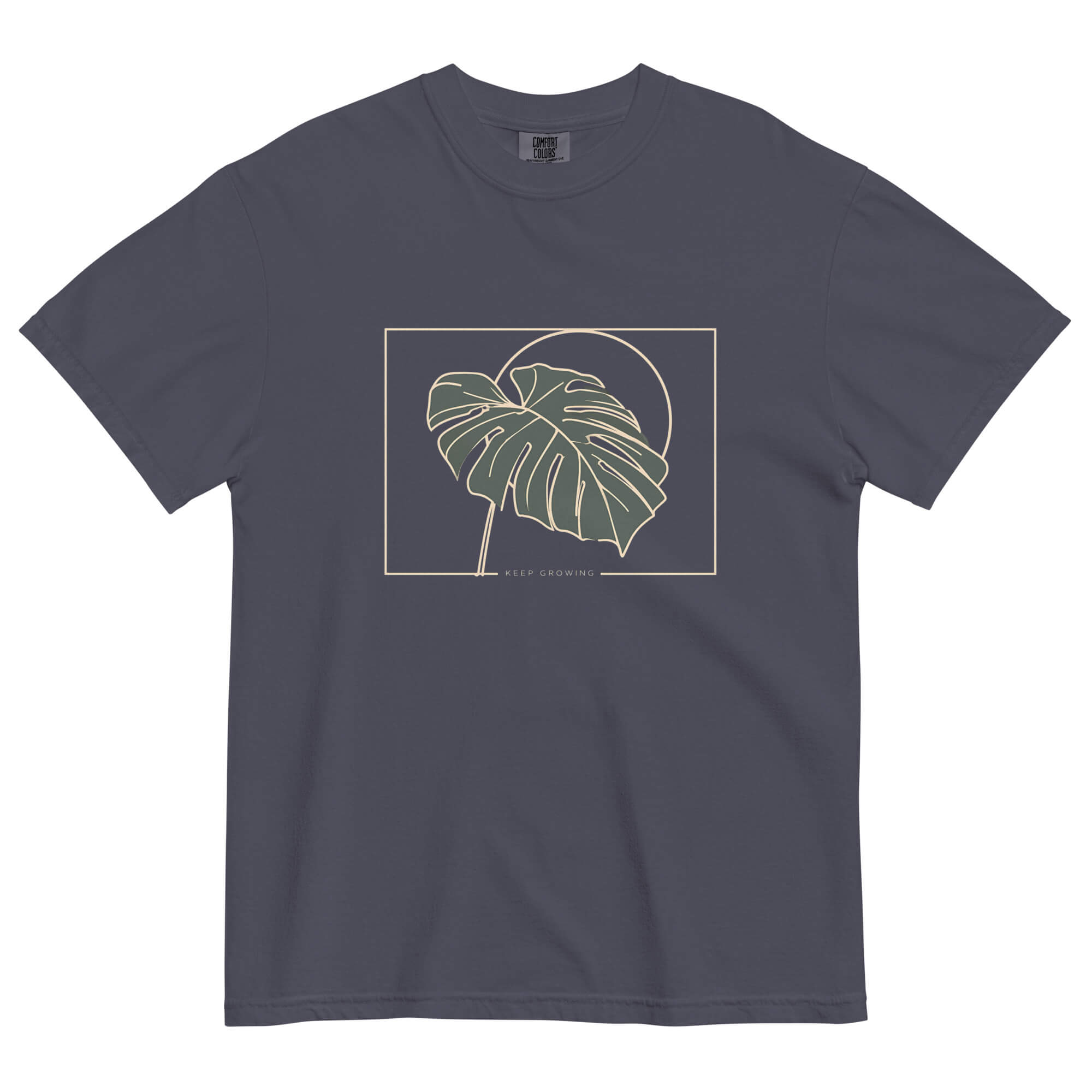 Monstera leaf design on a Navy garment-dyed cotton t-shirt