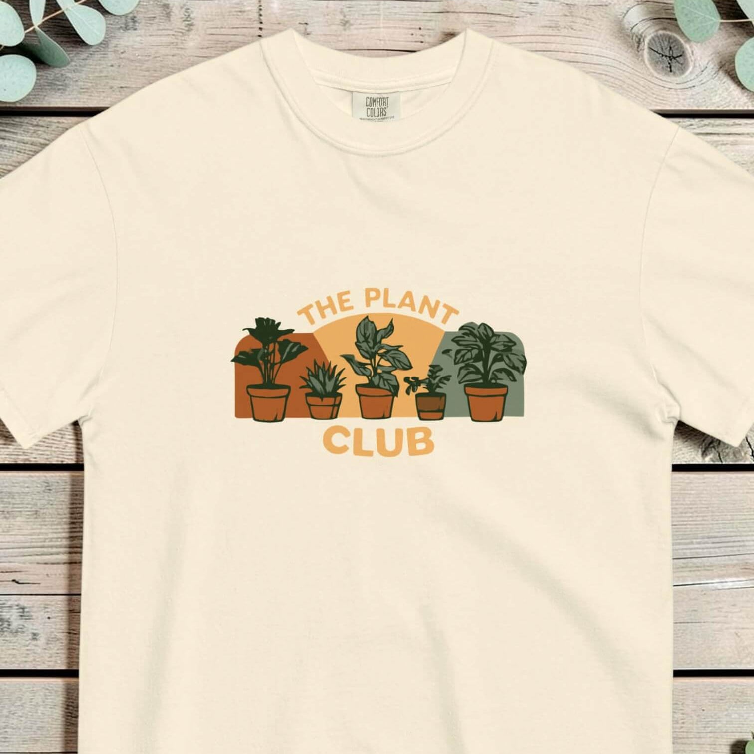 The Plant Club houseplants design on an Ivory garment-dyed cotton t-shirt