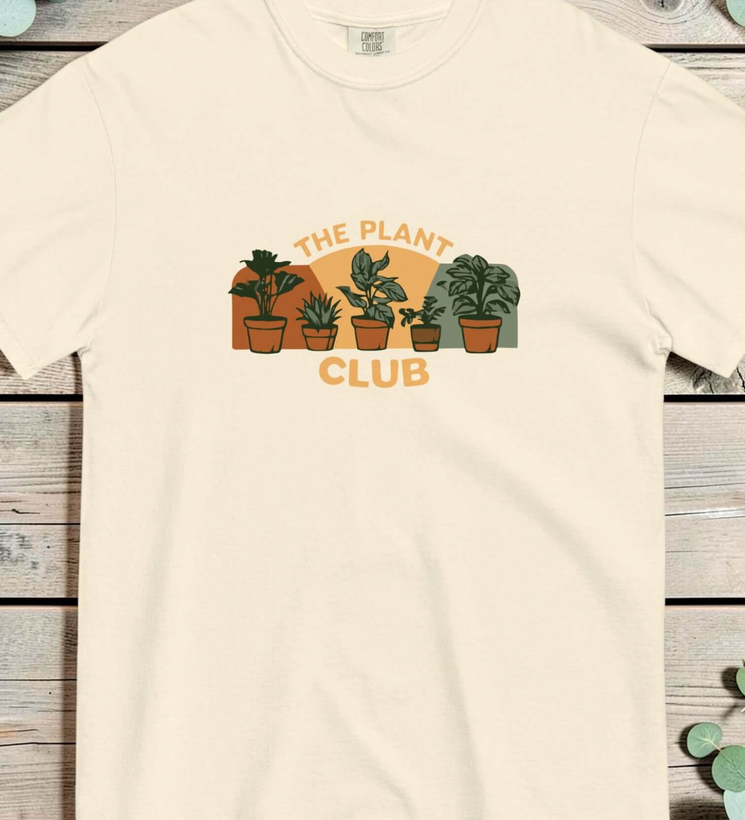 The Plant Club houseplants design on an Ivory garment-dyed cotton t-shirt