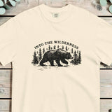 Bear and pine forest wilderness design on an Ivory garment-dyed cotton t-shirt