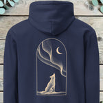 Back print of a white wolf howling beneath the northern lights inside an arched frame