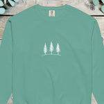 Small chest design of three simple pine trees in fine white line