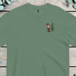 Small chest design of an elf in a red pointed hat standing beside a pine tree