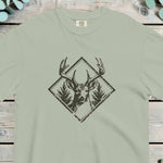 Stag head between two pine trees inside a diamond frame, antlers crossing the border