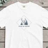 Deer and winter forest design on a White garment-dyed cotton t-shirt