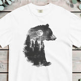 Bear and forest double exposure design on a White garment-dyed cotton t-shirt