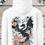 Large back print of a dark dragon curled among pink and blue flowers