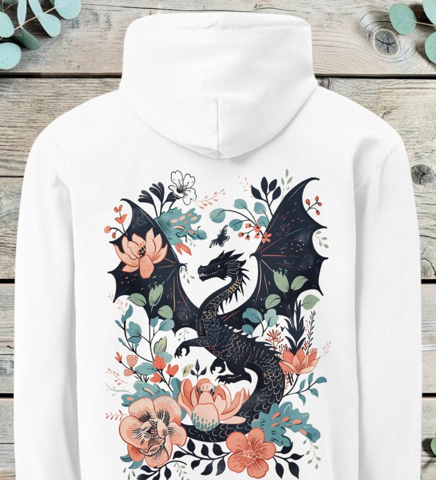 Large back print of a dark dragon curled among pink and blue flowers