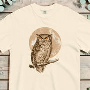 Great horned owl and moon design on an Ivory garment-dyed cotton t-shirt
