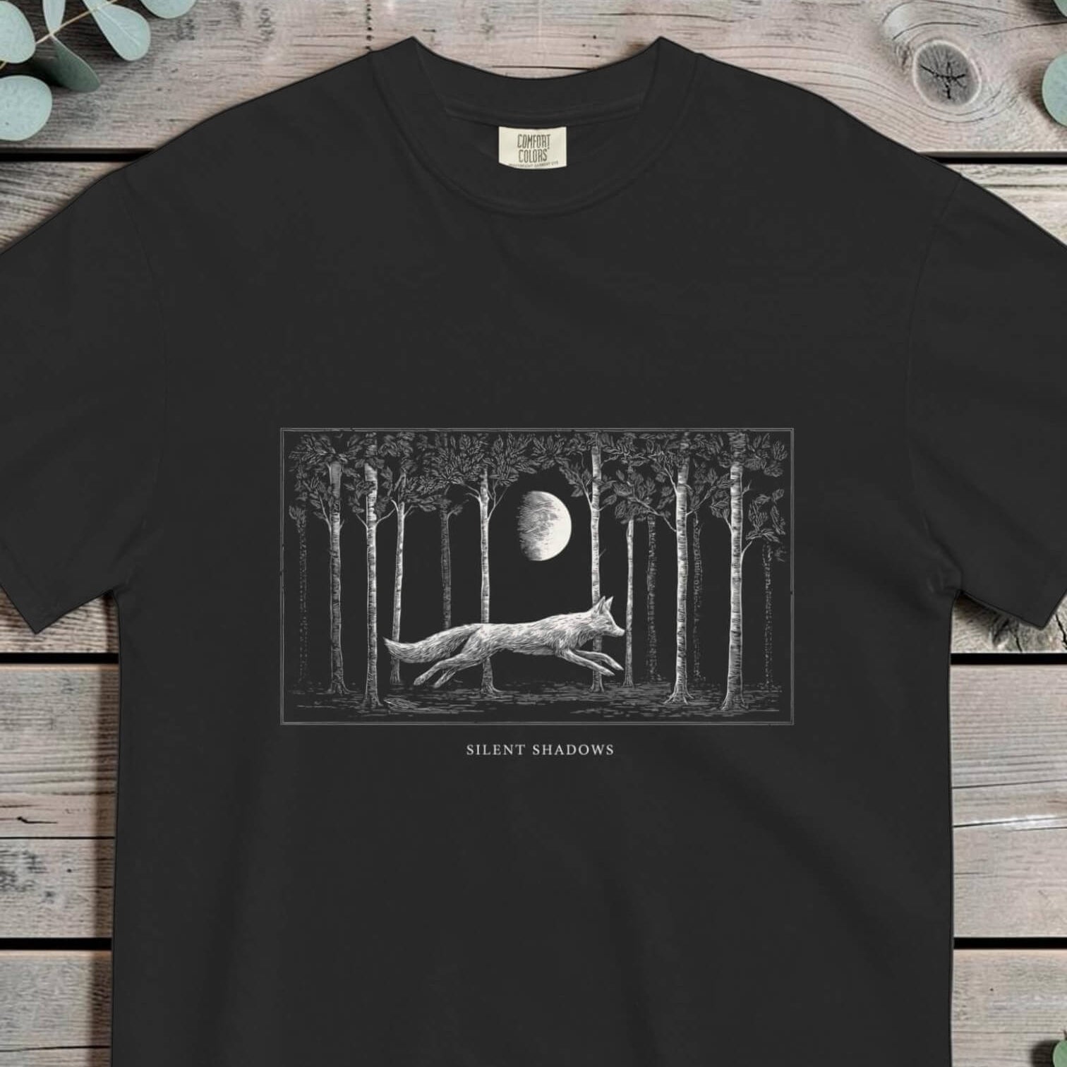 Fox running at full stride through a moonlit forest of tall bare trees
