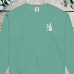 Small chest design of a top-hatted snowman beside a Christmas tree on a sweatshirt