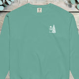 Small chest design of a top-hatted snowman beside a Christmas tree on a sweatshirt