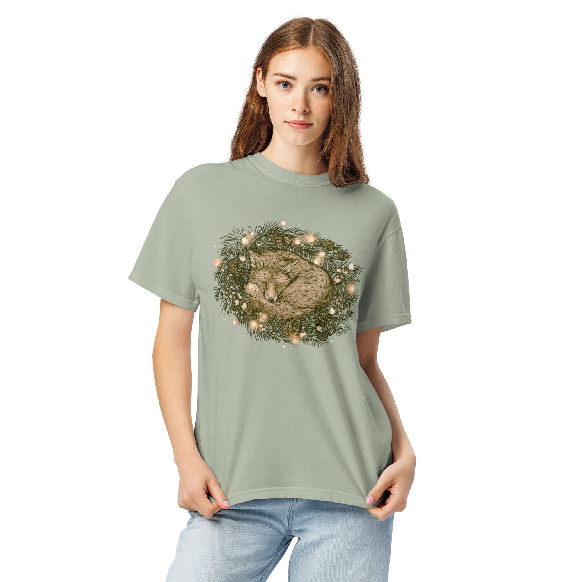 Fox asleep in a Christmas wreath design on a Bay garment-dyed cotton t-shirt