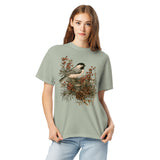 Chickadee and winter berries design on a Bay garment-dyed cotton t-shirt