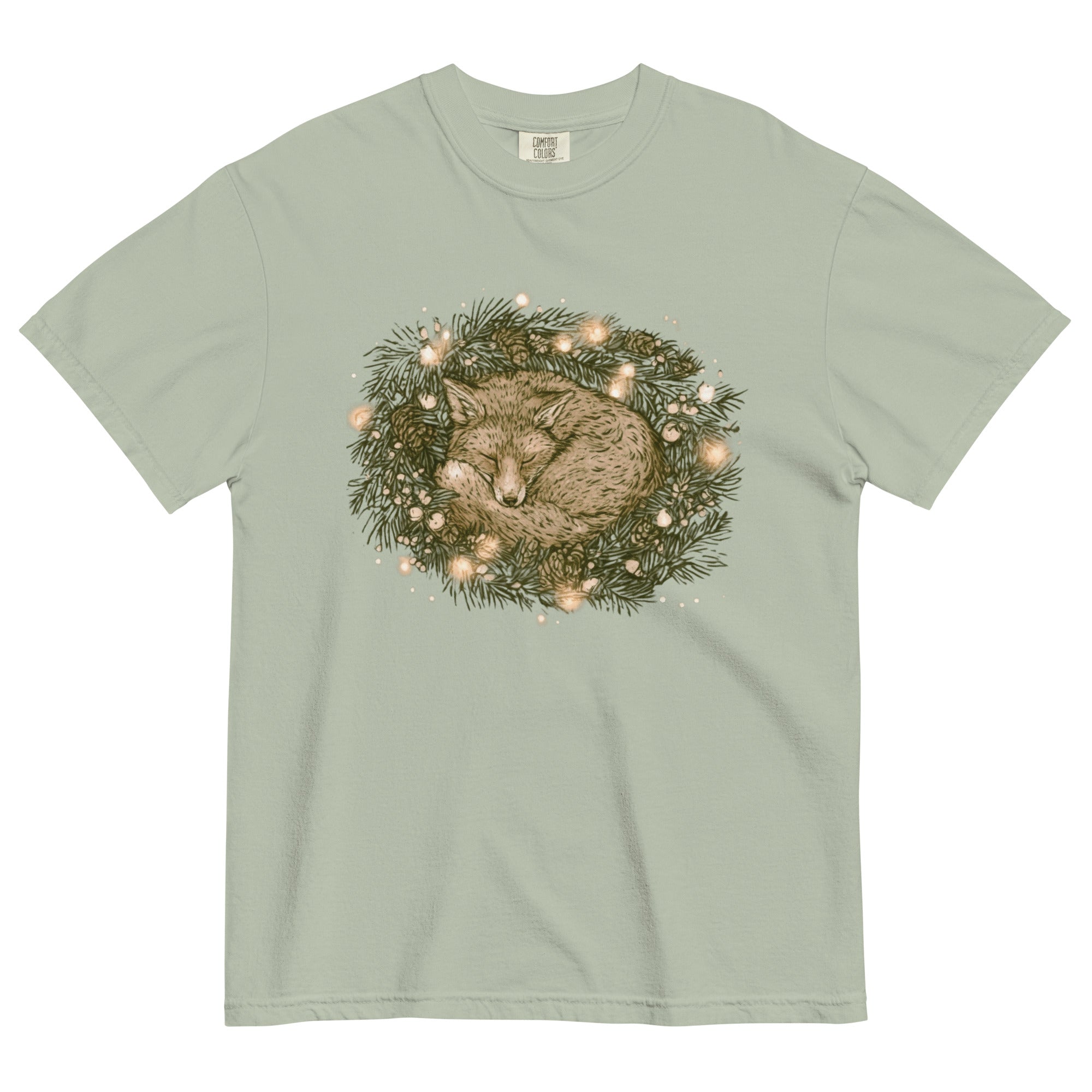 Fox asleep in a Christmas wreath design on a Bay garment-dyed cotton t-shirt