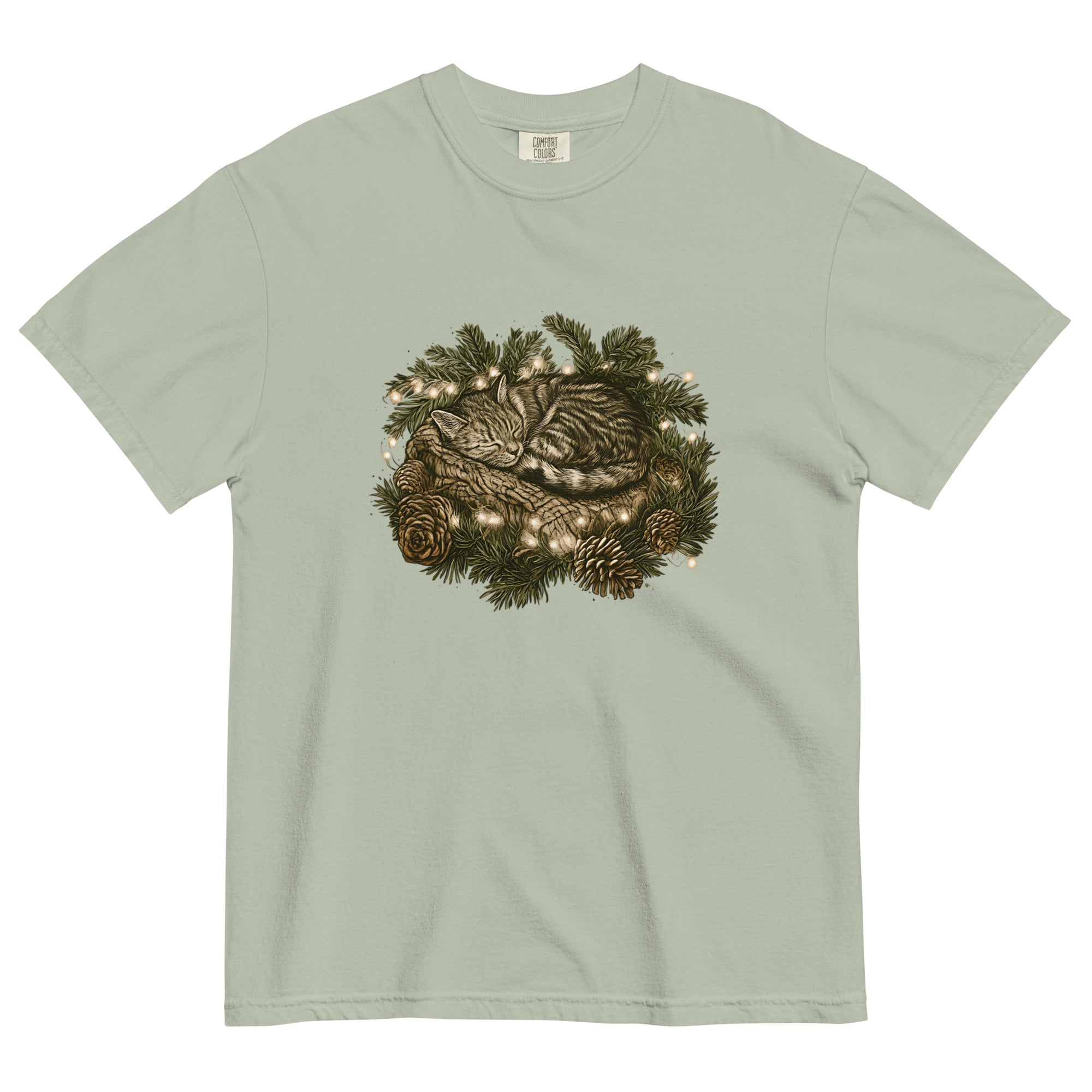 Kitten asleep in a Christmas wreath design on a Bay garment-dyed cotton t-shirt