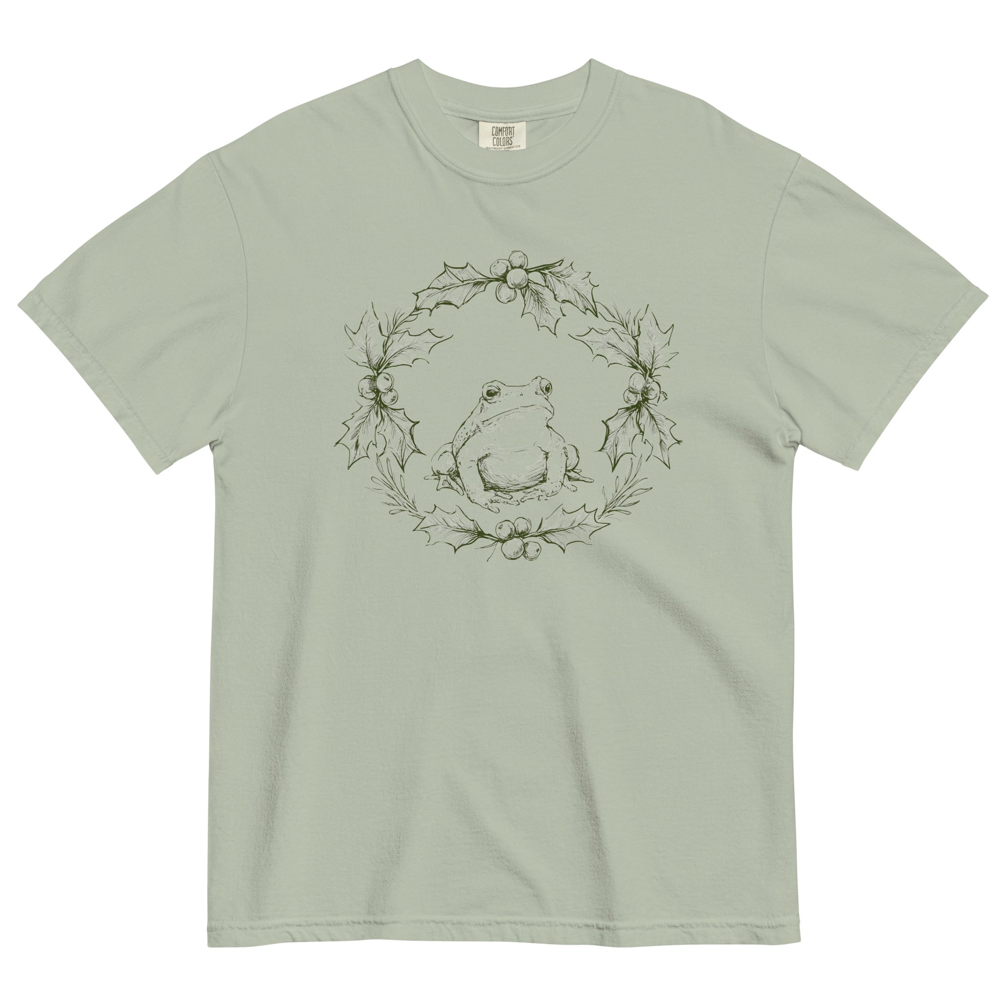 Frog in a holly wreath design on a Bay garment-dyed cotton t-shirt