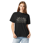 Nocturnal Botanics fern and flower design on a Black garment-dyed cotton t-shirt