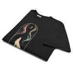 Howling wolf and aurora design on a Black garment-dyed cotton t-shirt