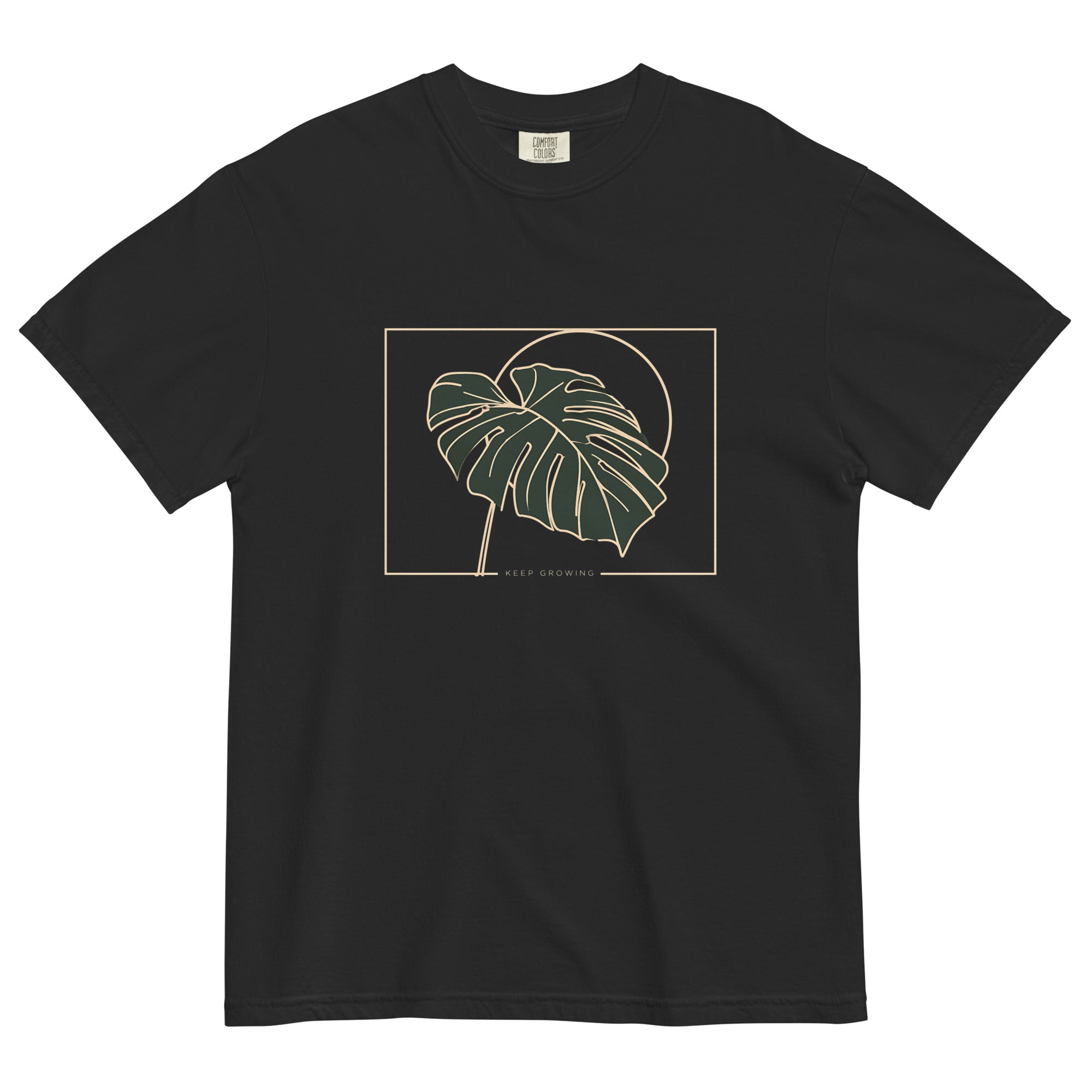 Monstera leaf design on a Black garment-dyed cotton t-shirt