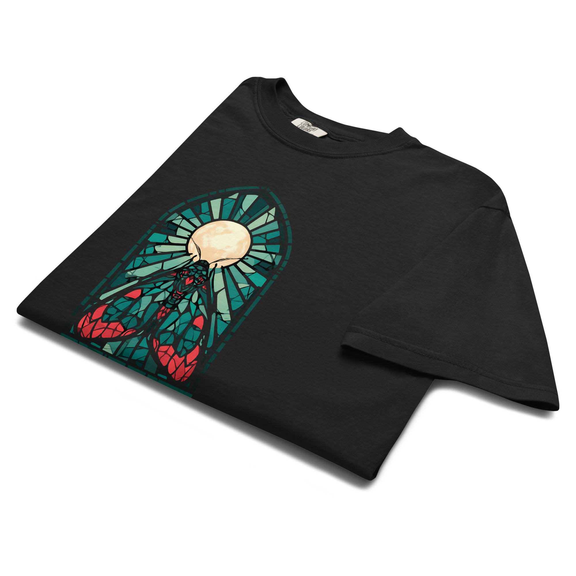 Moth in a stained glass window design on a Black garment-dyed cotton t-shirt