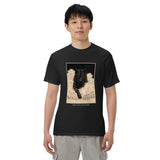 Black wolf in deep snow design on a Black garment-dyed cotton t-shirt