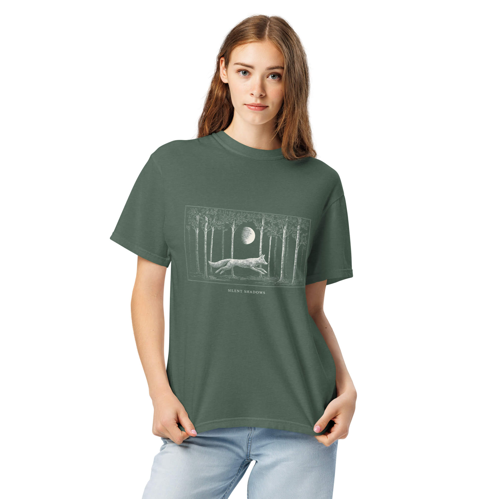 Running fox moonlit forest design on a Blue Spruce garment-dyed cotton t-shirt