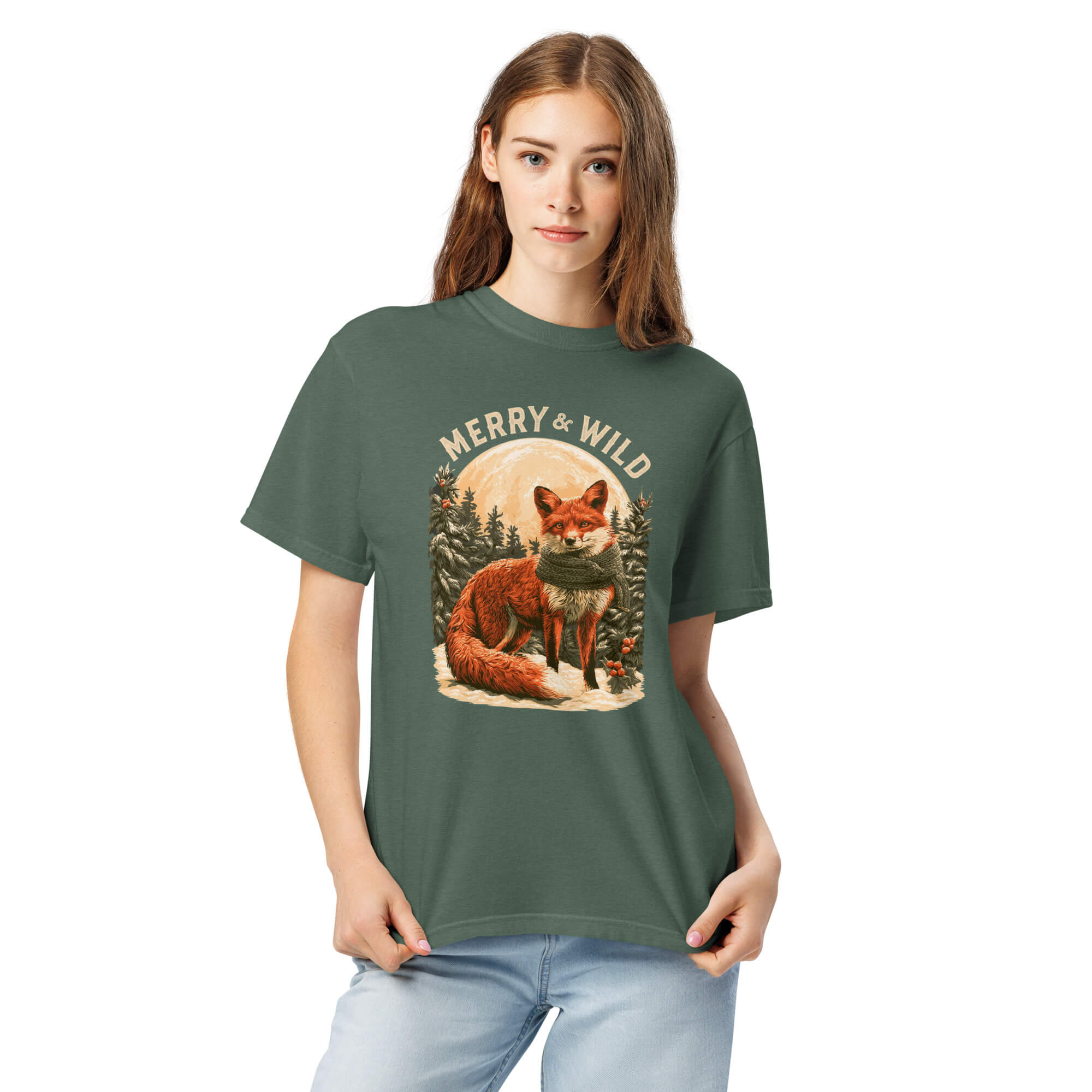 Fox in the snow Christmas design on a Blue Spruce garment-dyed cotton t-shirt