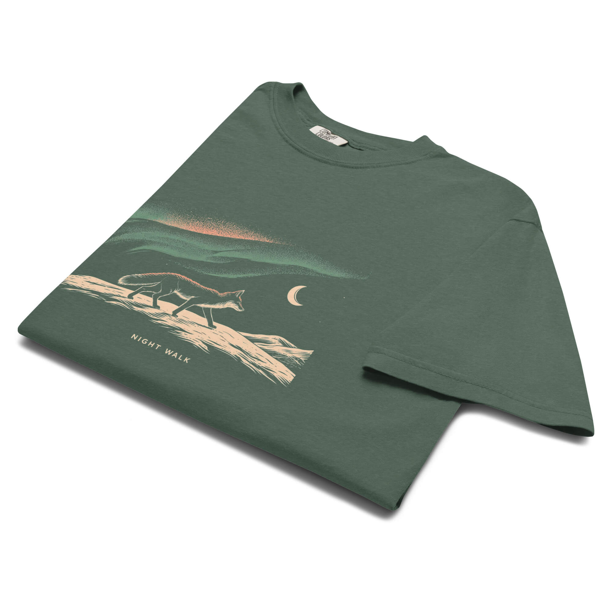 Fox and northern lights design on a Blue Spruce garment-dyed cotton t-shirt