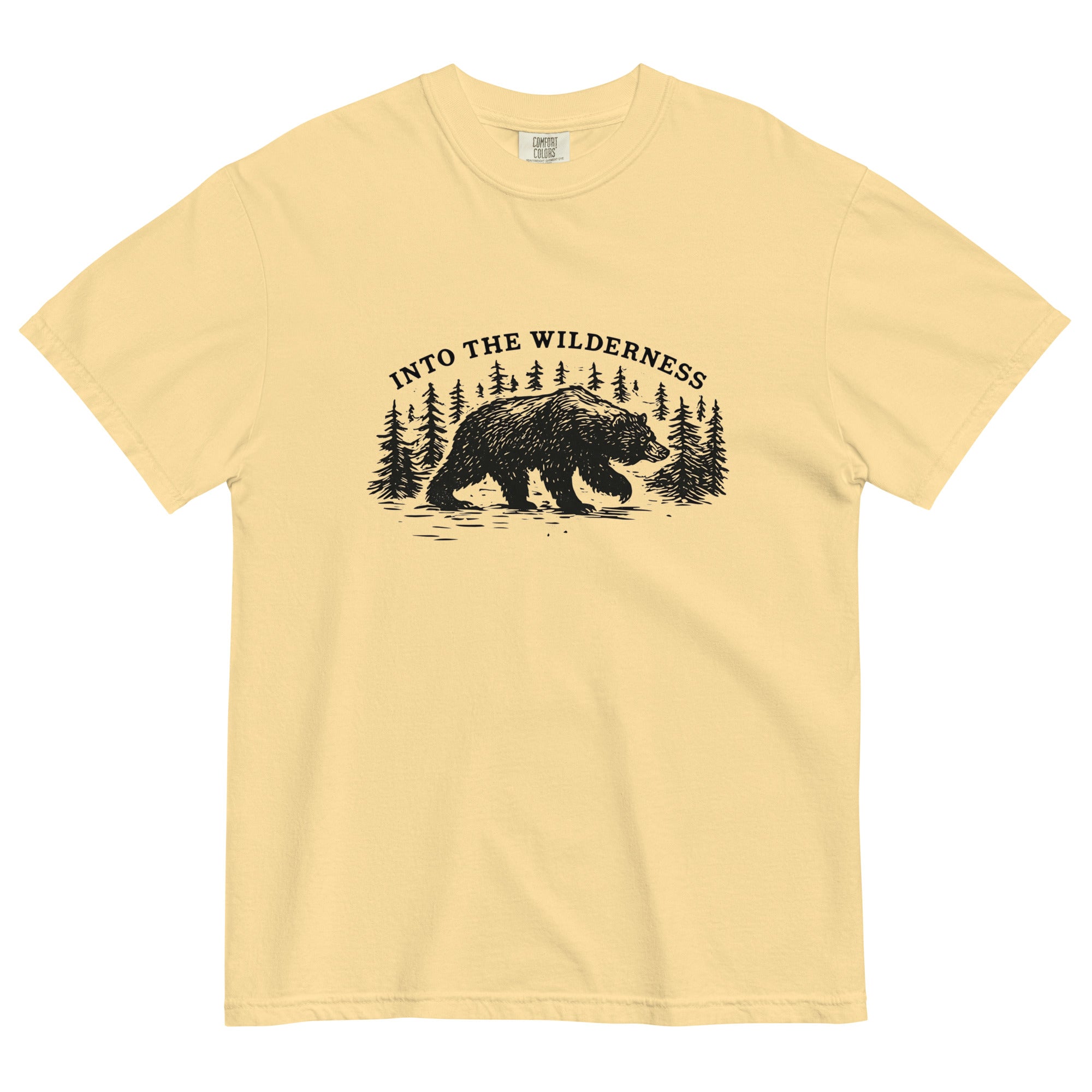 Bear and pine forest wilderness design on a Butter garment-dyed cotton t-shirt