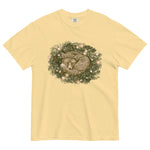 Fox asleep in a Christmas wreath design on a Butter garment-dyed cotton t-shirt