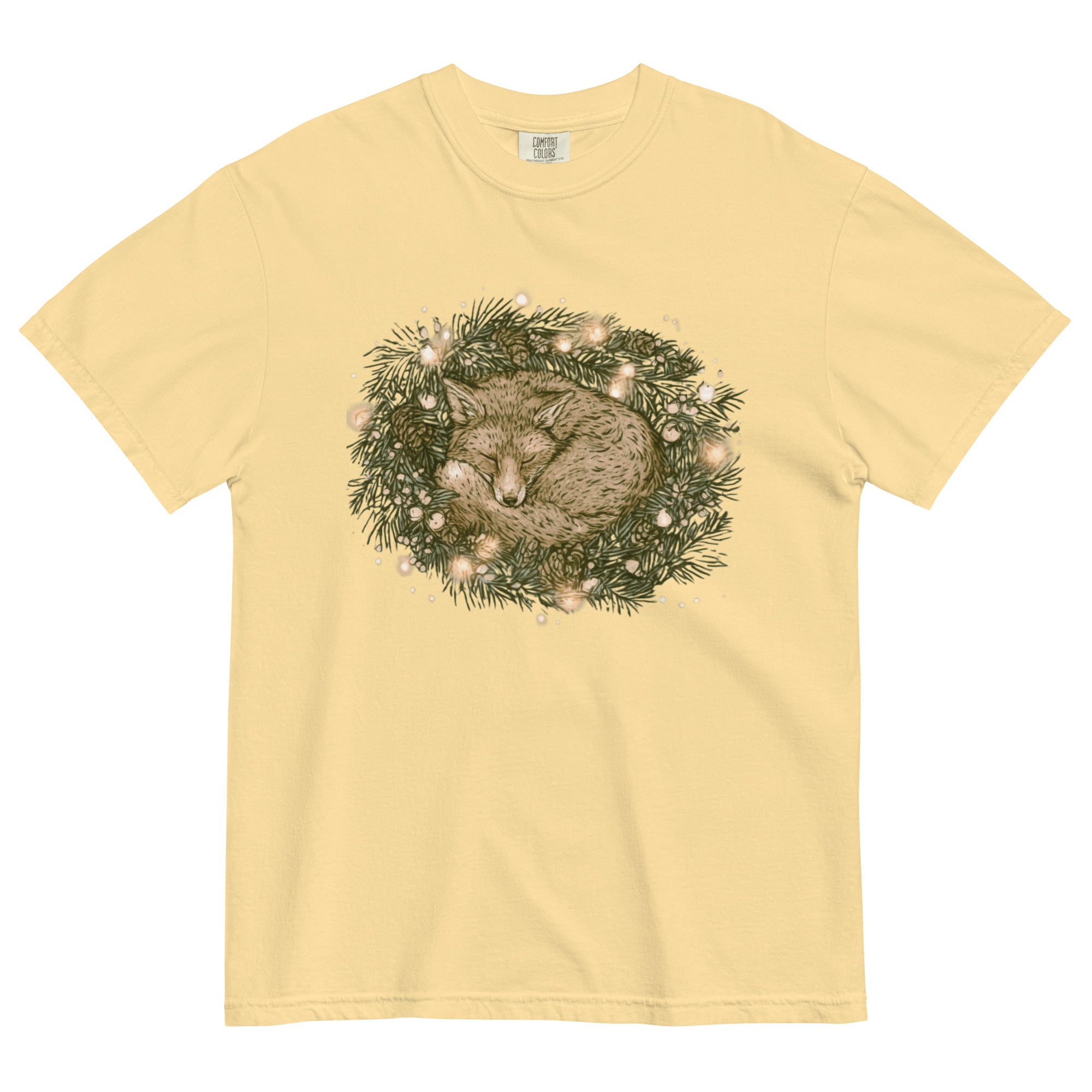 Fox asleep in a Christmas wreath design on a Butter garment-dyed cotton t-shirt
