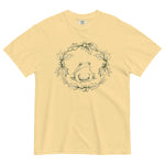 Frog in a holly wreath design on a Butter garment-dyed cotton t-shirt