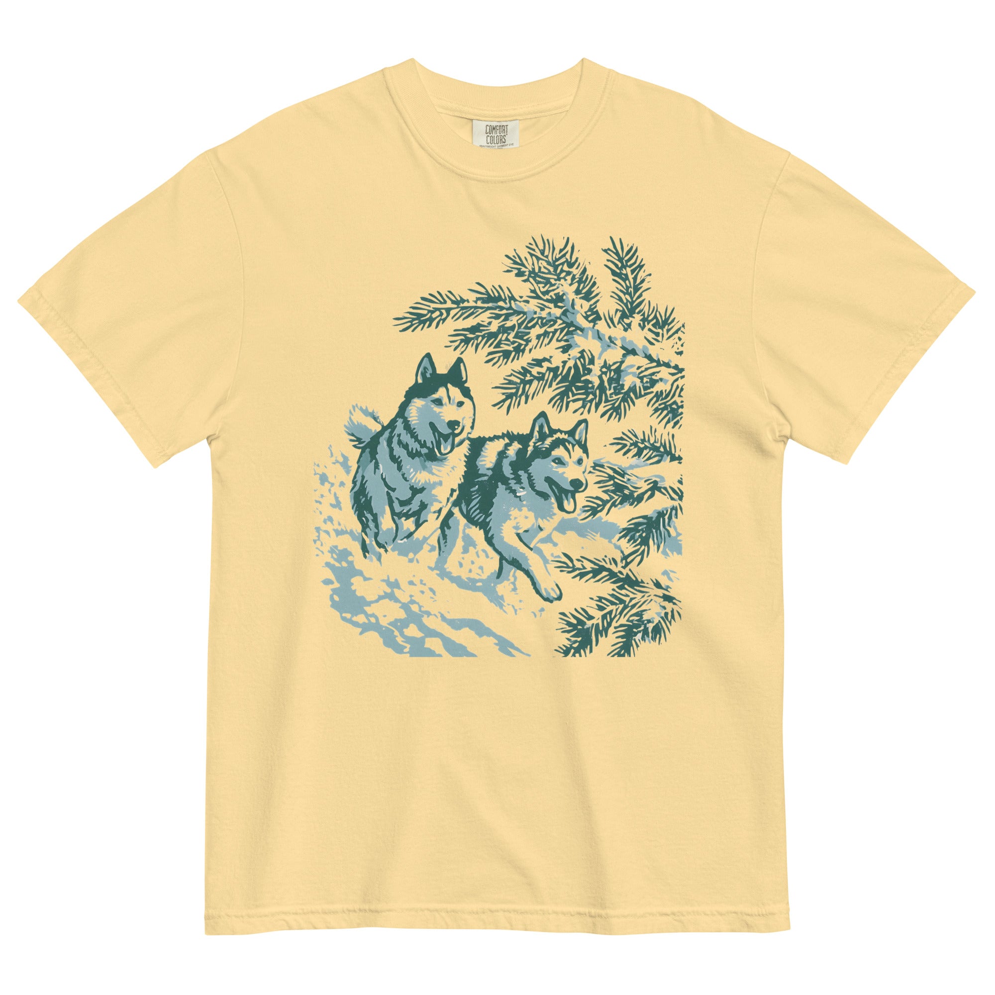 Huskies running in the snow design on a Butter garment-dyed cotton t-shirt