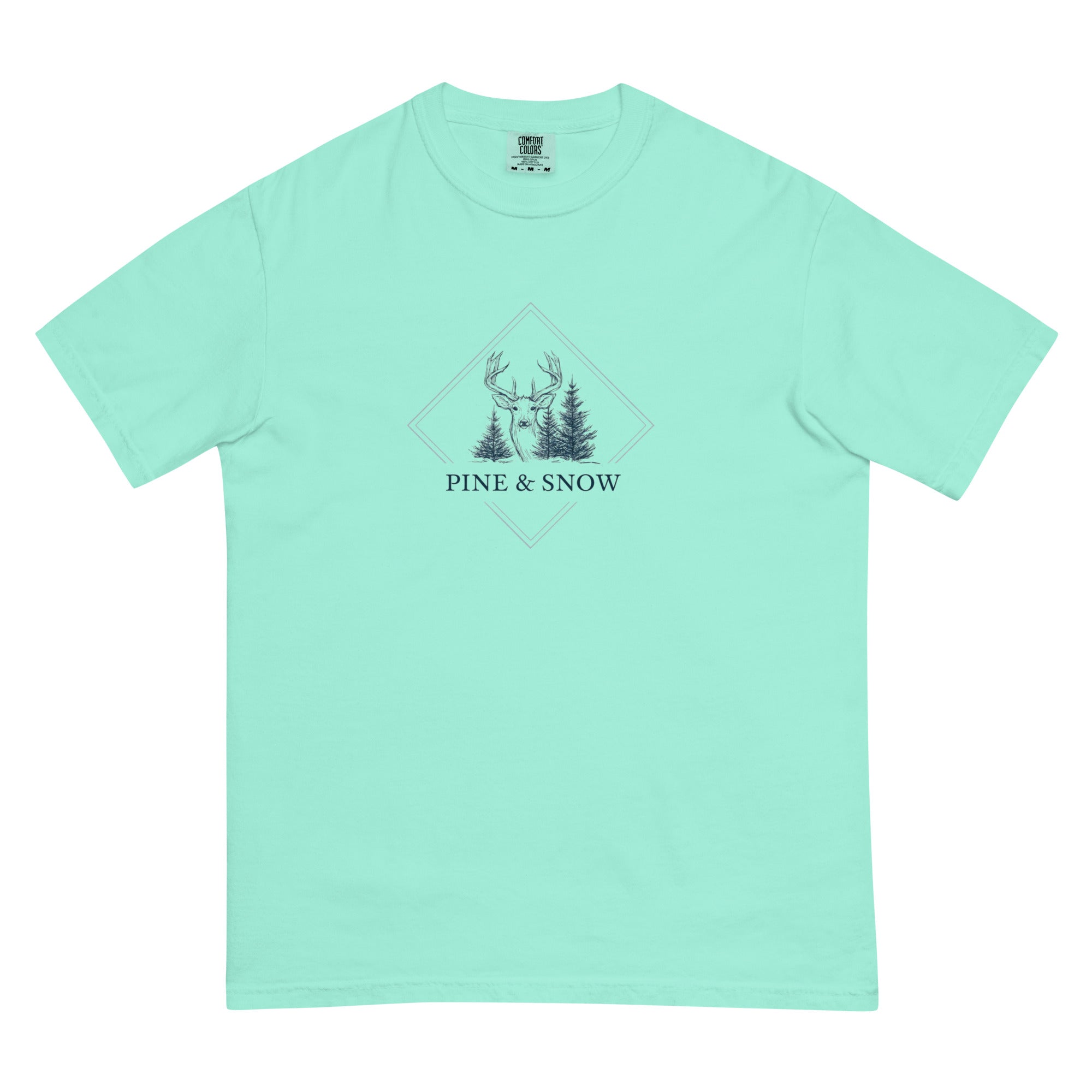 Deer and winter forest design on a Chalky Mint garment-dyed cotton t-shirt