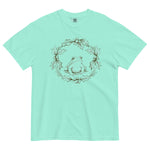 Frog in a holly wreath design on a Chalky Mint garment-dyed cotton t-shirt