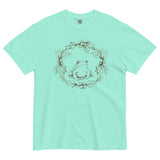 Frog in a holly wreath design on a Chalky Mint garment-dyed cotton t-shirt