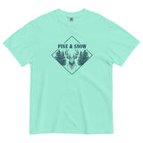 Stag emblem with pine and snow design on a Chalky Mint garment-dyed cotton t-shirt