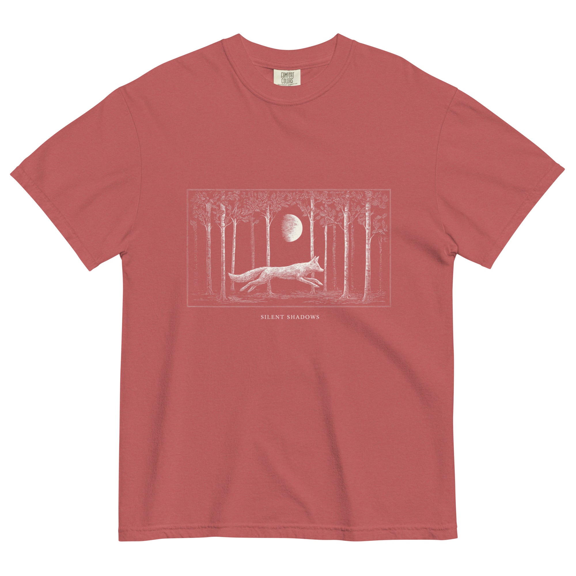 Running fox moonlit forest design on a Crimson garment-dyed cotton t-shirt