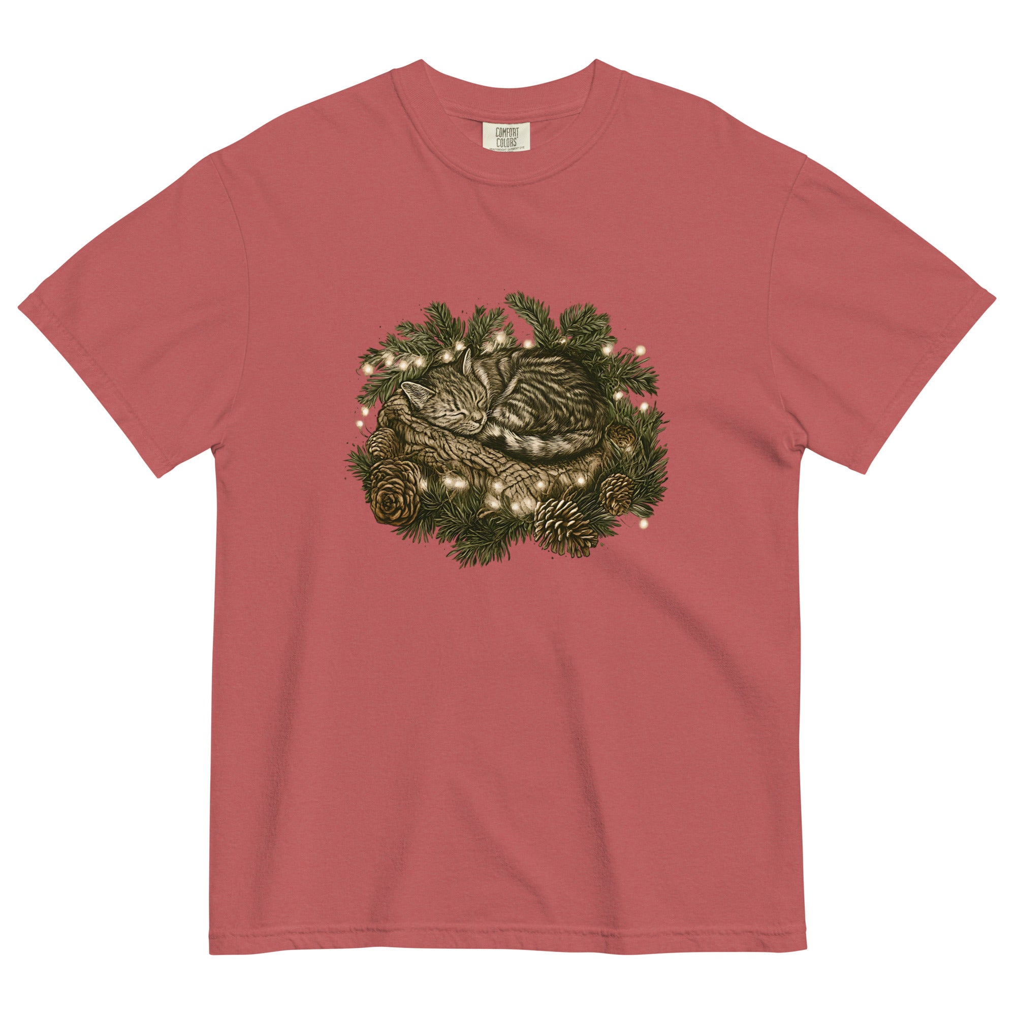 Kitten asleep in a Christmas wreath design on a Crimson garment-dyed cotton t-shirt
