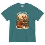 Fox in the snow Christmas design on an Emerald garment-dyed cotton t-shirt