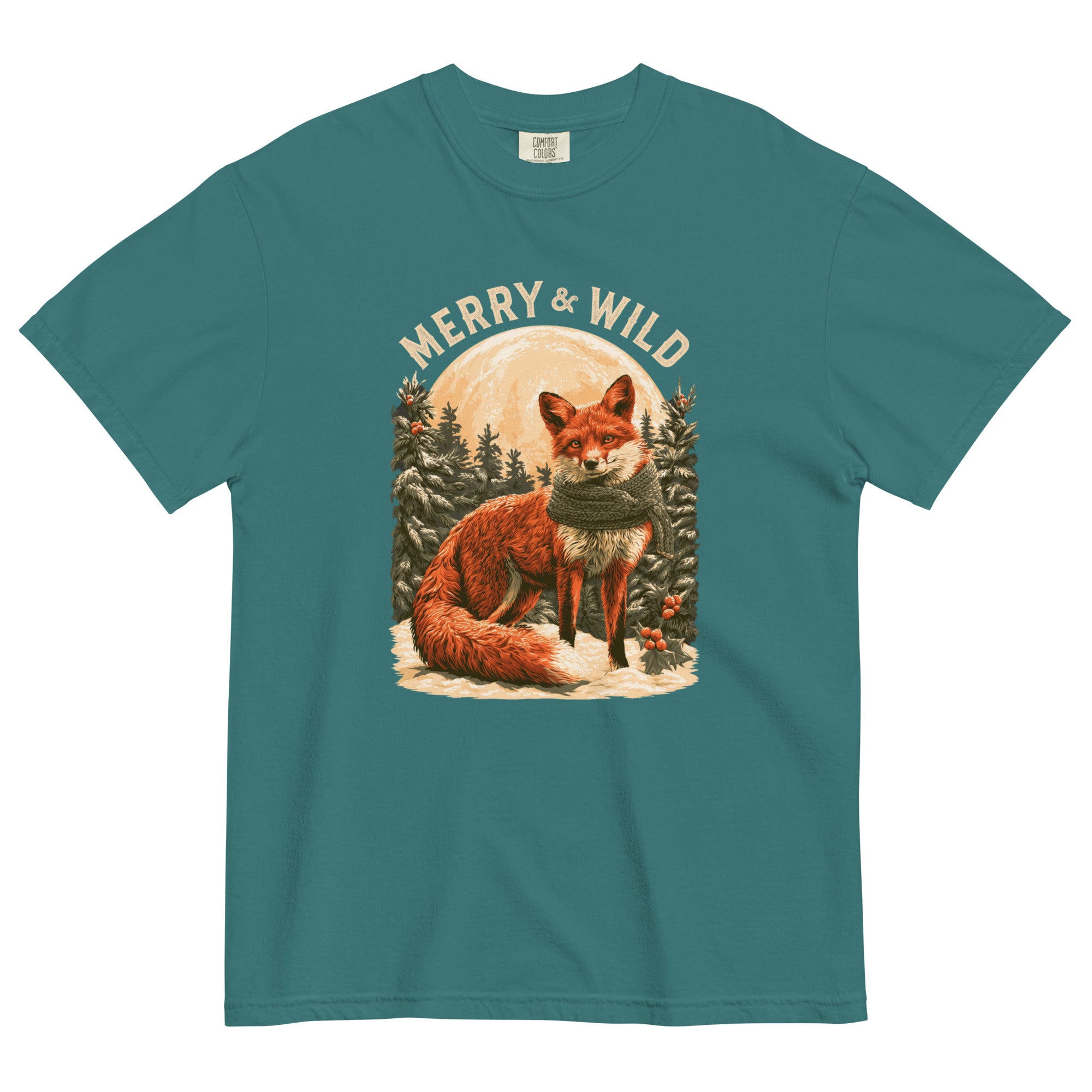 Fox in the snow Christmas design on an Emerald garment-dyed cotton t-shirt