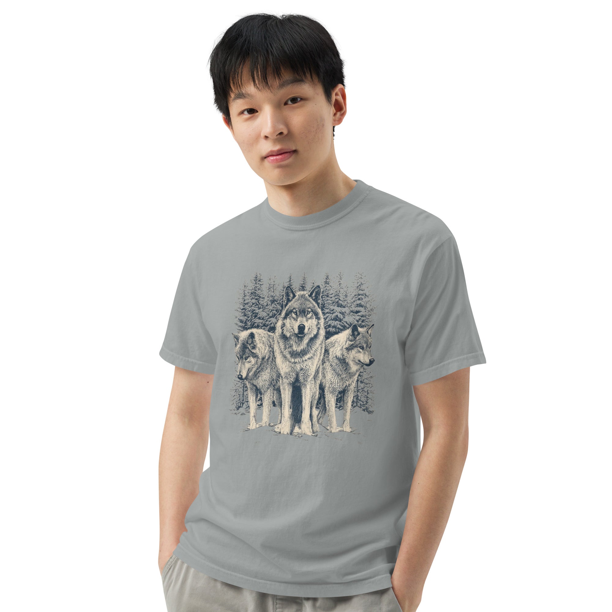 Three wolves in the snow design on a Granite garment-dyed cotton t-shirt