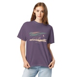 Fox and northern lights design on a Grape garment-dyed cotton t-shirt