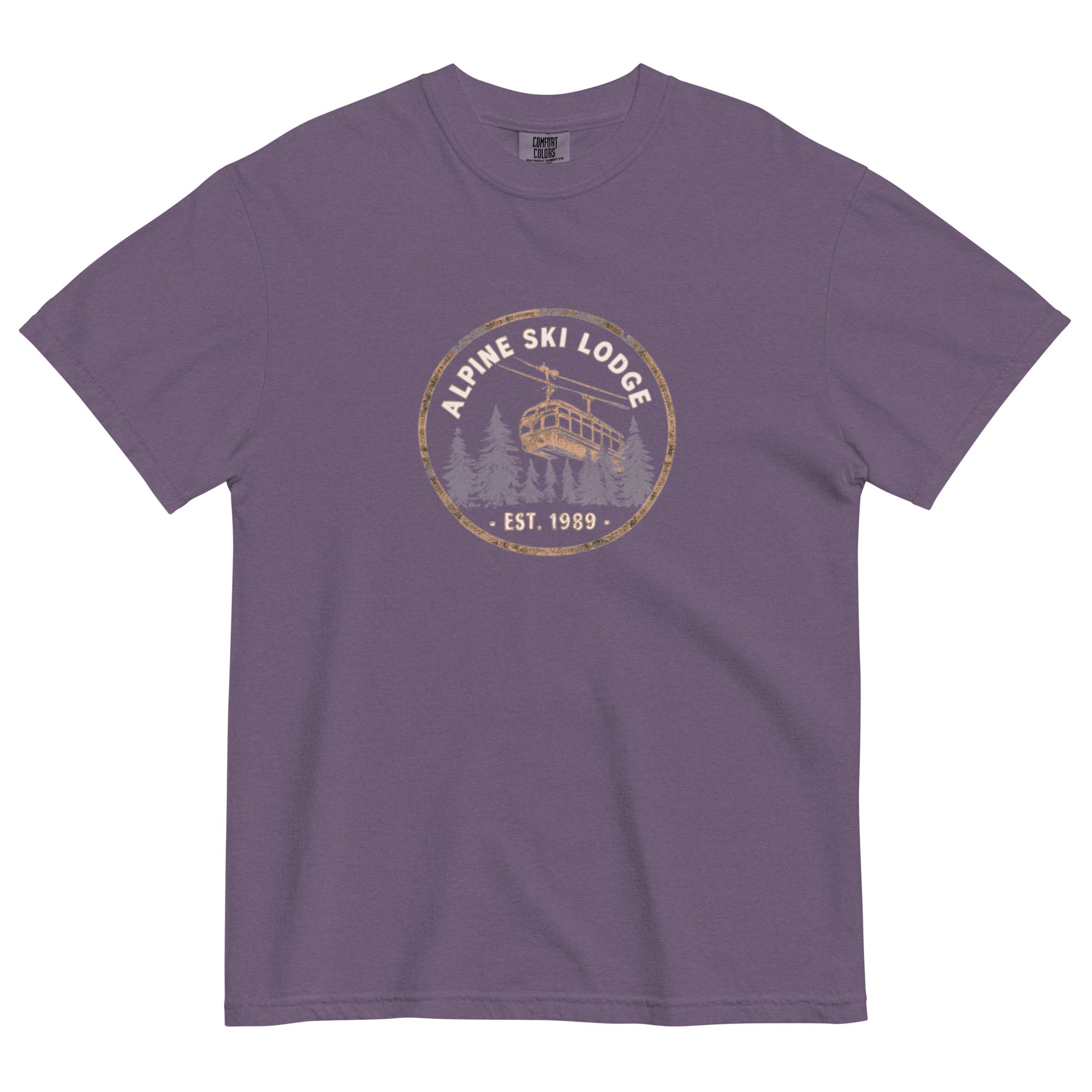 Alpine ski lodge gondola badge design on a Grape garment-dyed cotton t-shirt
