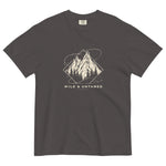 Mountain peaks and orbital rings design on a Graphite garment-dyed cotton t-shirt