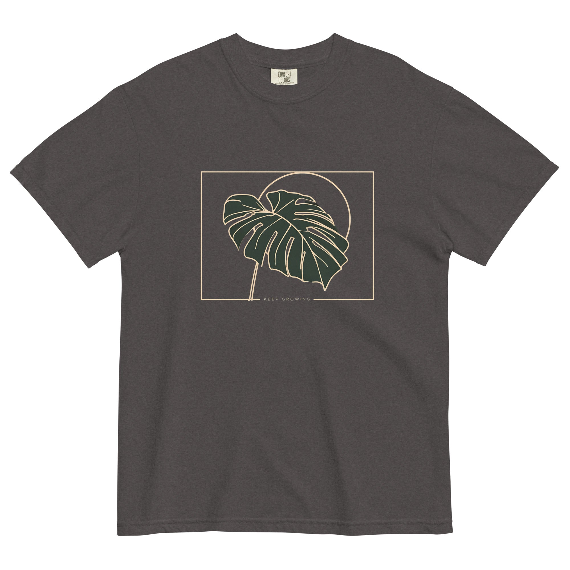 Monstera leaf design on a Graphite garment-dyed cotton t-shirt