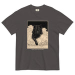 Black wolf in deep snow design on a Graphite garment-dyed cotton t-shirt
