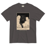 Black wolf in deep snow design on a Graphite garment-dyed cotton t-shirt