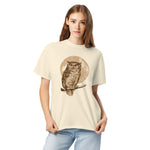 Great horned owl and moon design on an Ivory garment-dyed cotton t-shirt